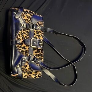Chic Leopard Print Handbag with Black Accents